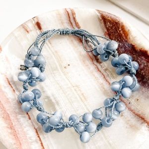 • blue beaded bracelet •